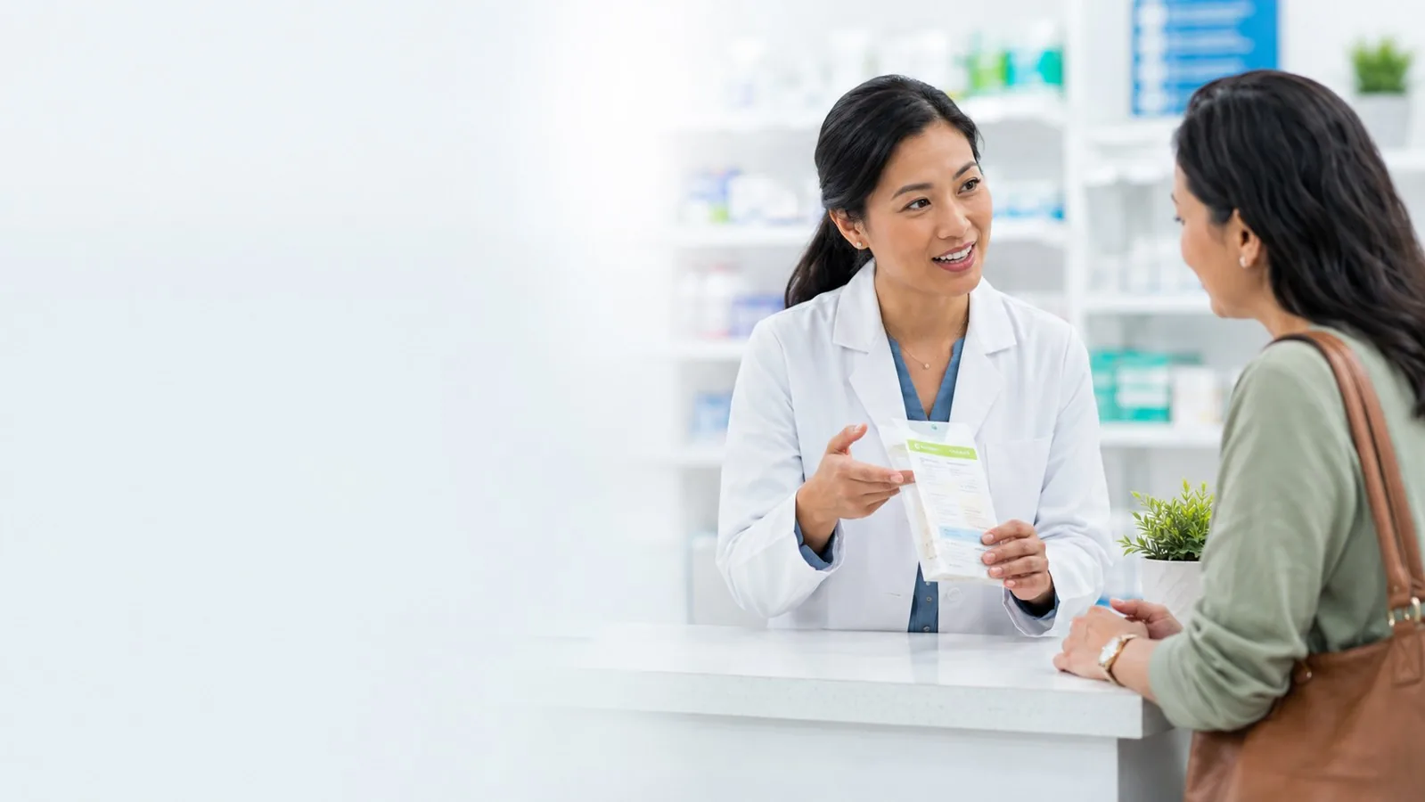 Pharmacist counseling a patient