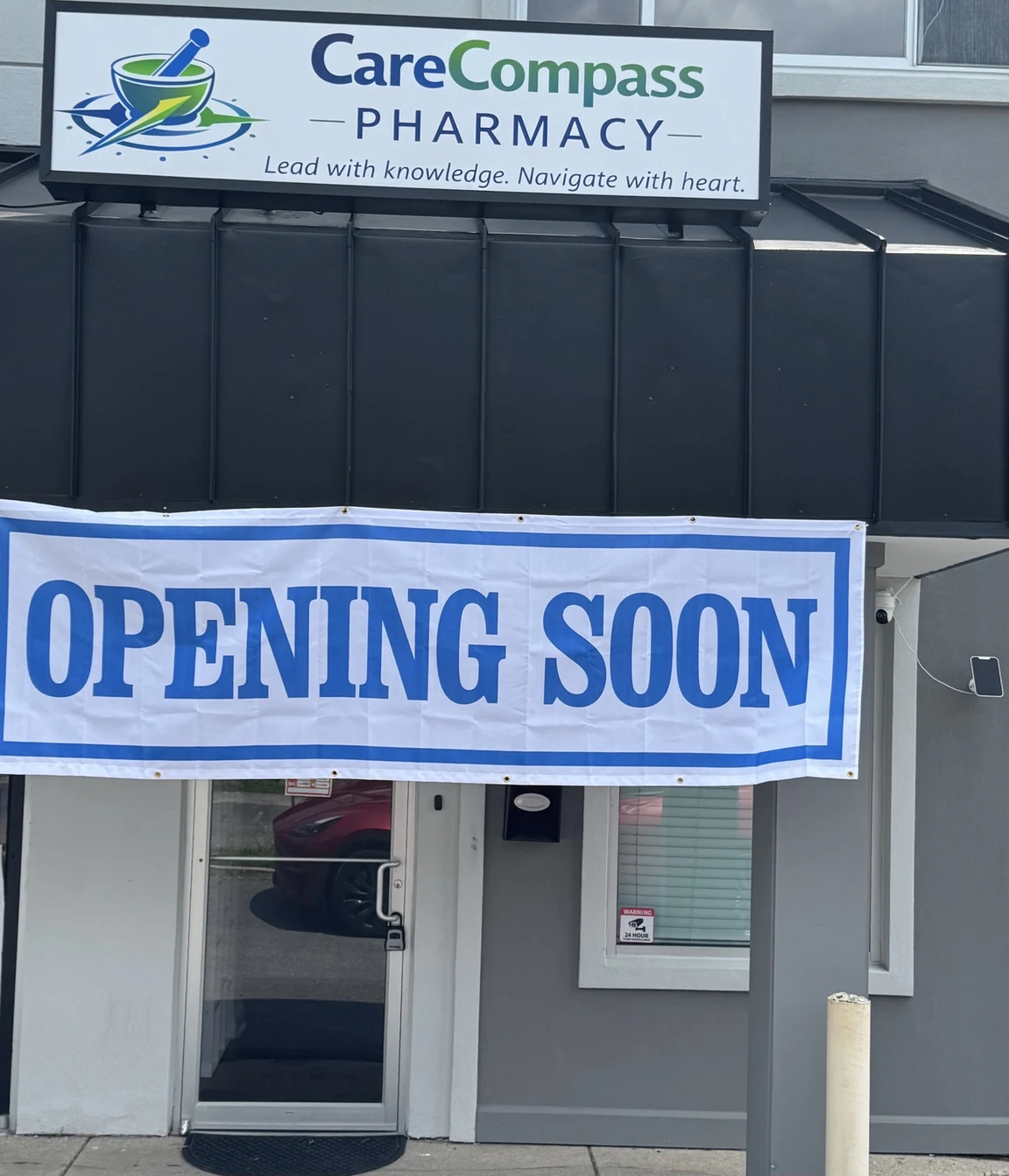 CareCompass Pharmacy storefront with Opening Soon banner at 11701 Roby Ave in Beltsville